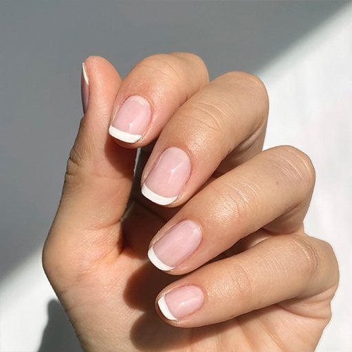 French manicured hand - Essie 