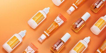 rows of essie nail care products including the cuticle remover and cuticle oils in different formats
