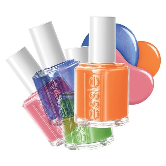 four bottles of essie nail polish from the be them all collection layered on top of each other