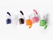 six different colors of essie nail polish beside a swatch for each shade