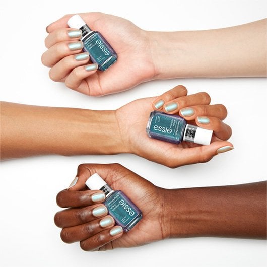spectrum shift deep metallic teal nail polish on 3 skin tones
